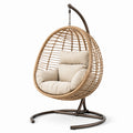 Sedia da giardino sospesa in rattan e metallo con cuscini beige